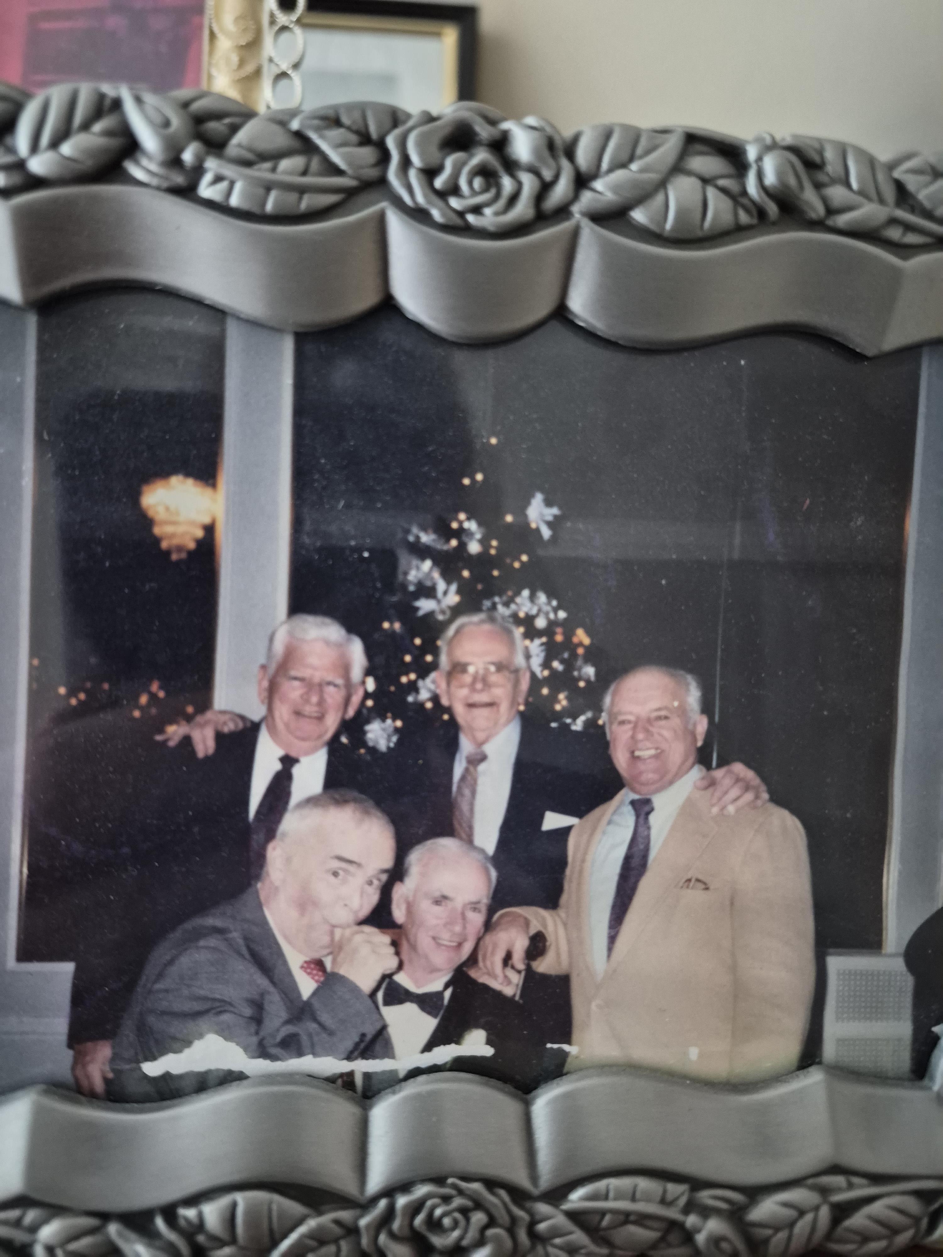 A group of men in a frame