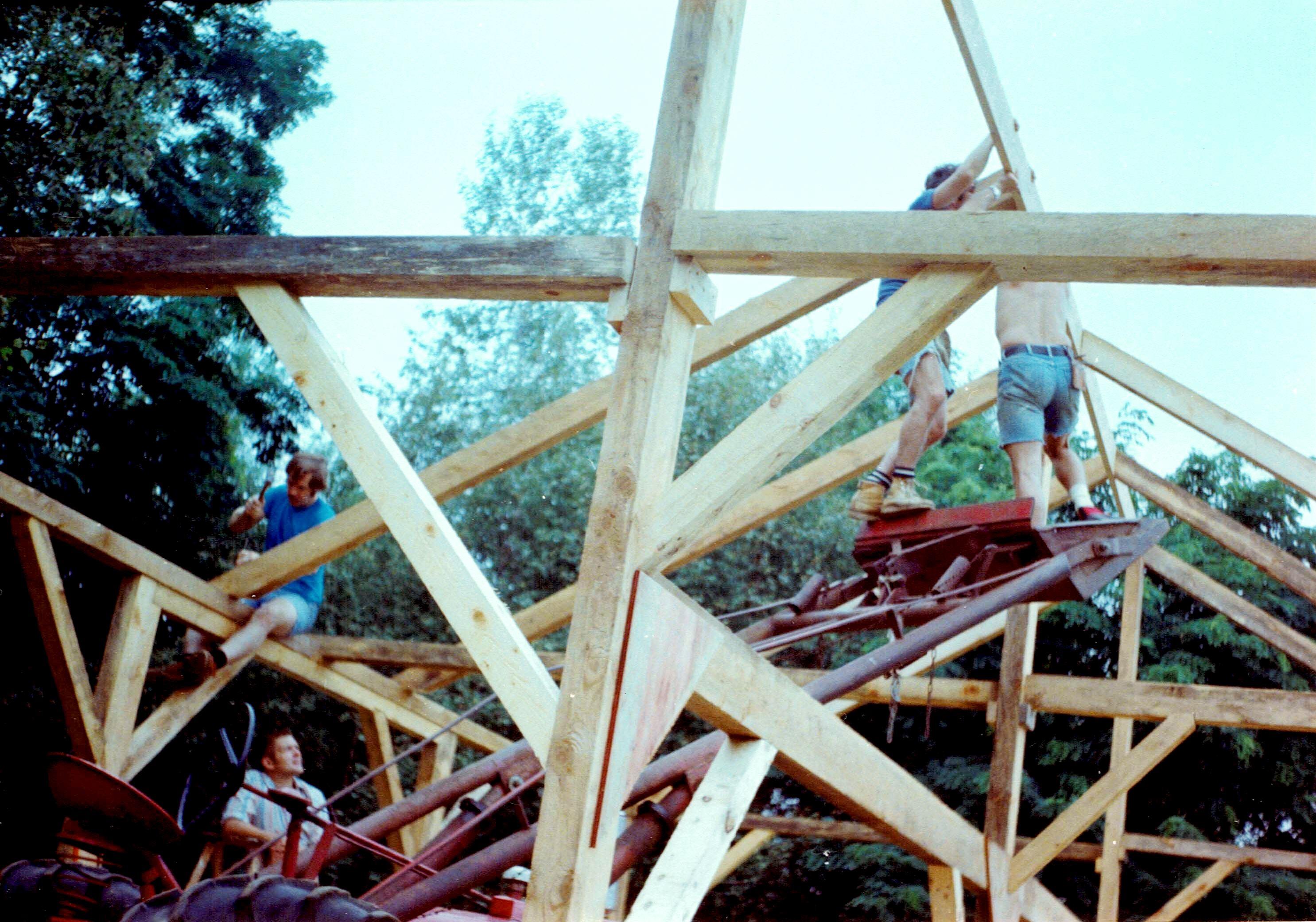 A group of men working on a structure