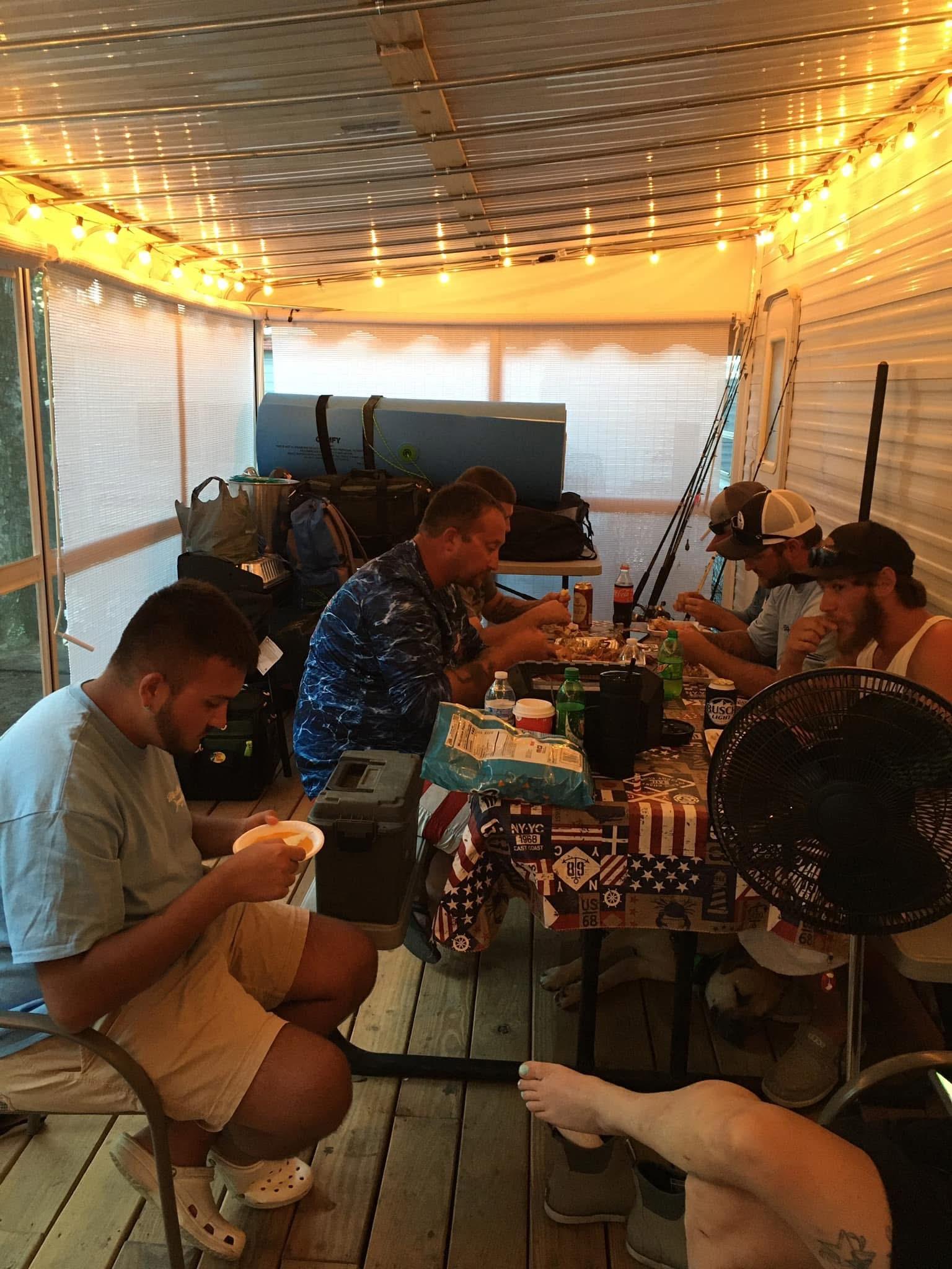 A group of people sitting around a table