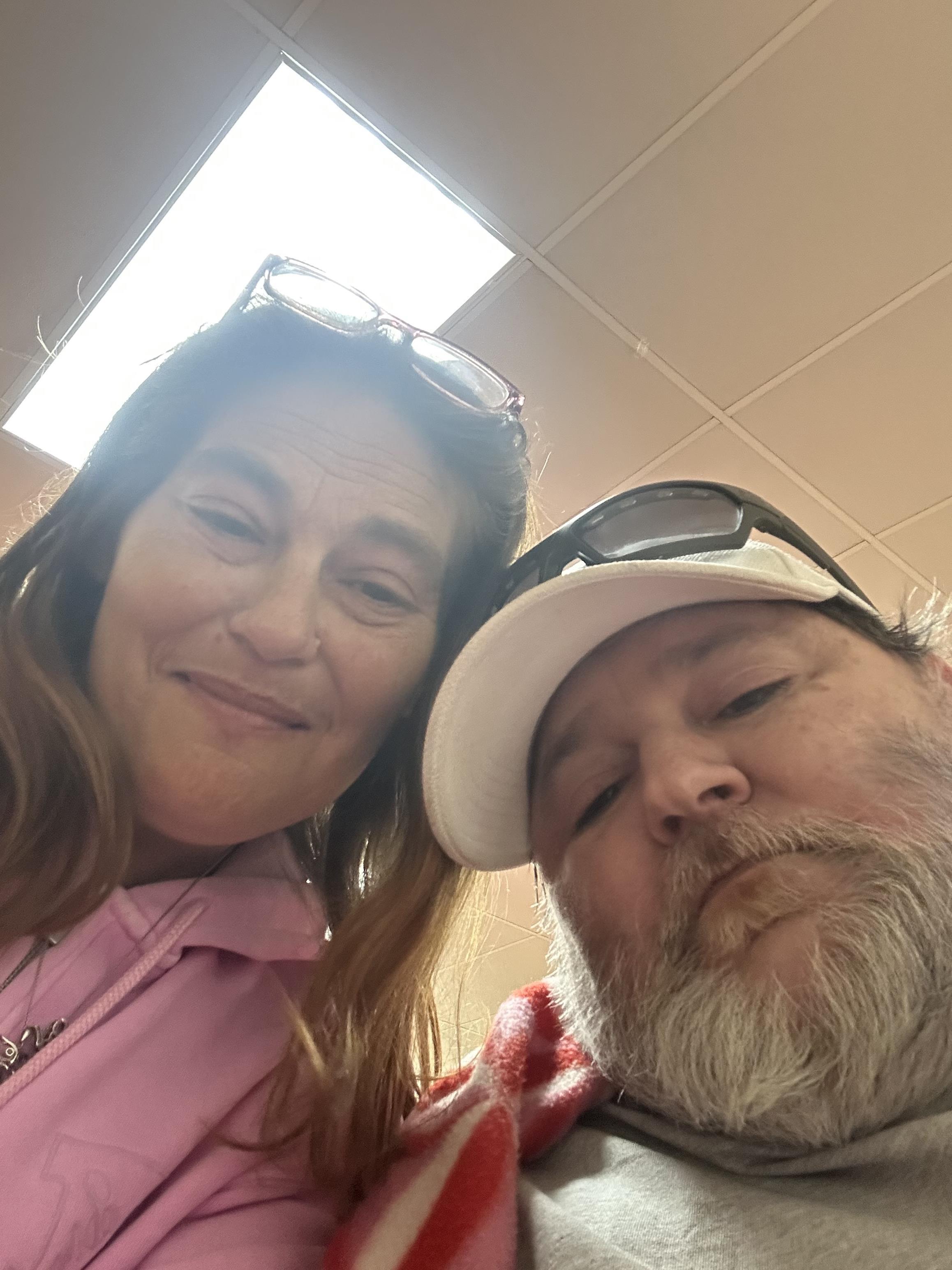 A man and woman taking a selfie