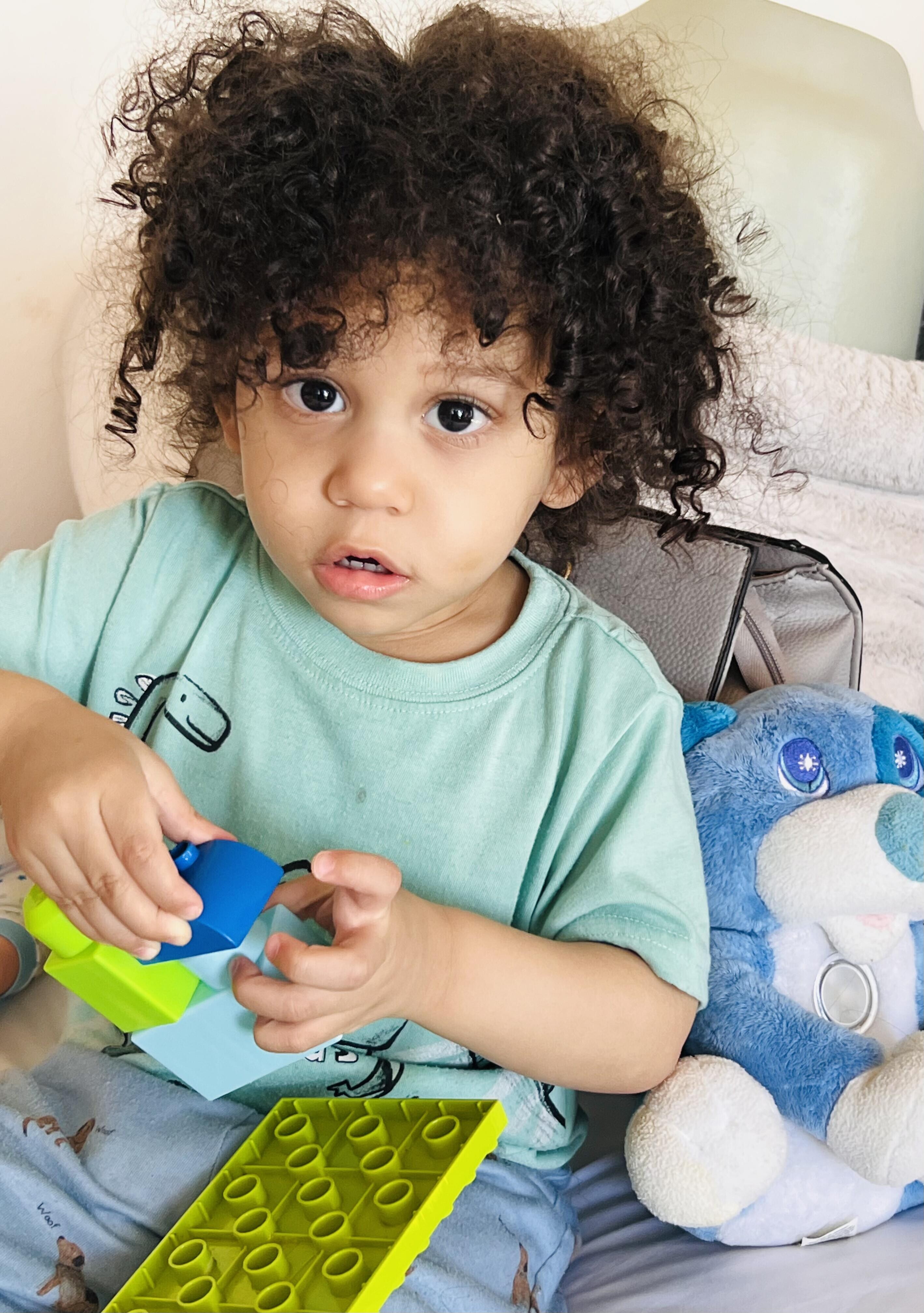 A child playing with toys
