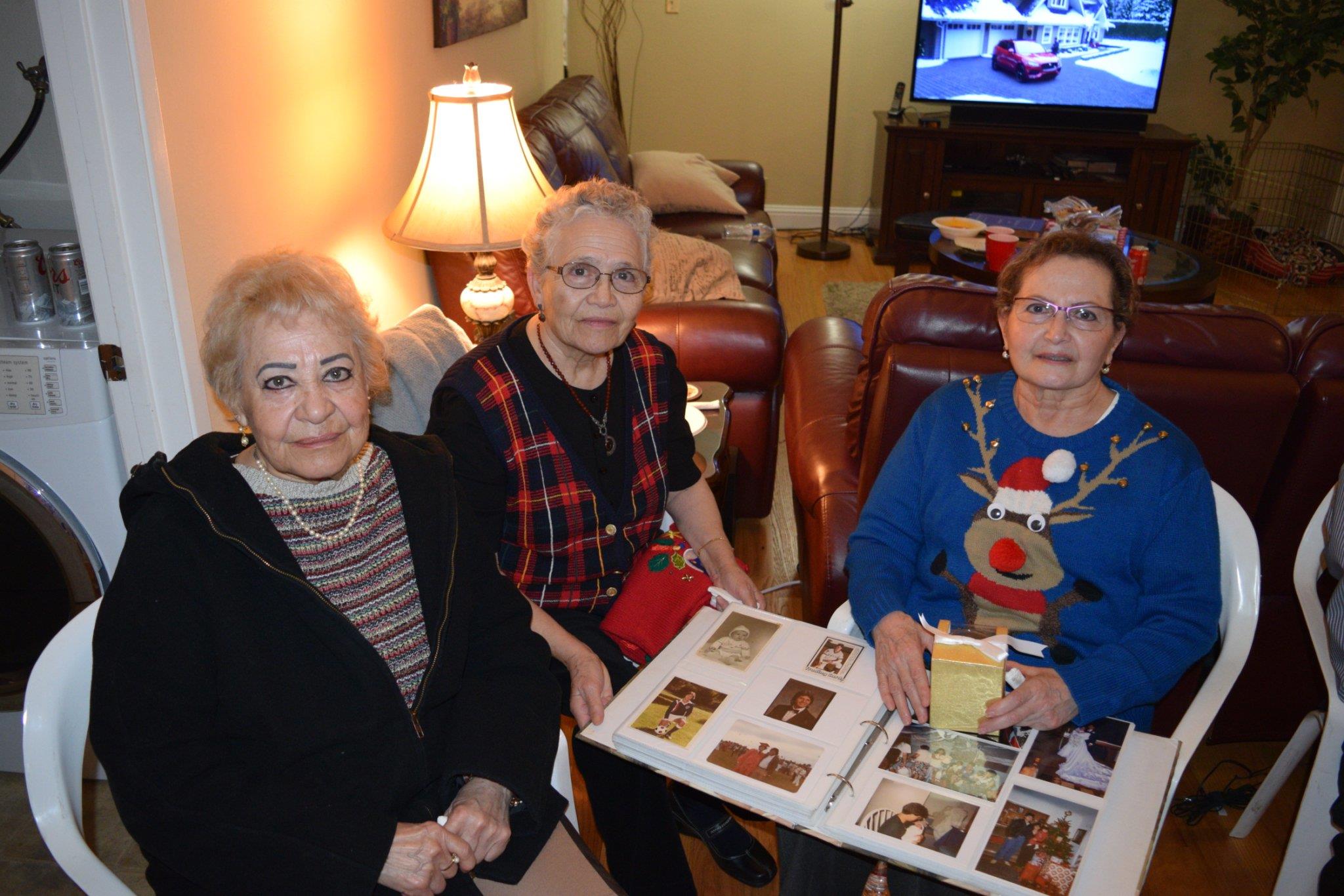 A group of women sitting in a living room