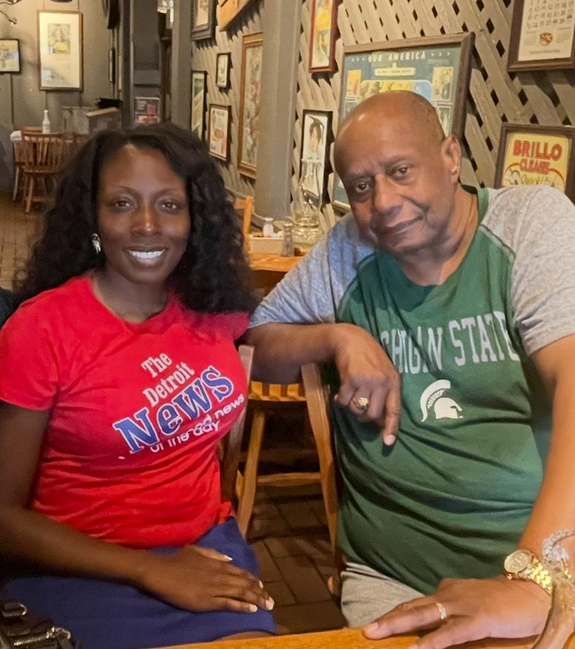 A man and woman sitting in chairs