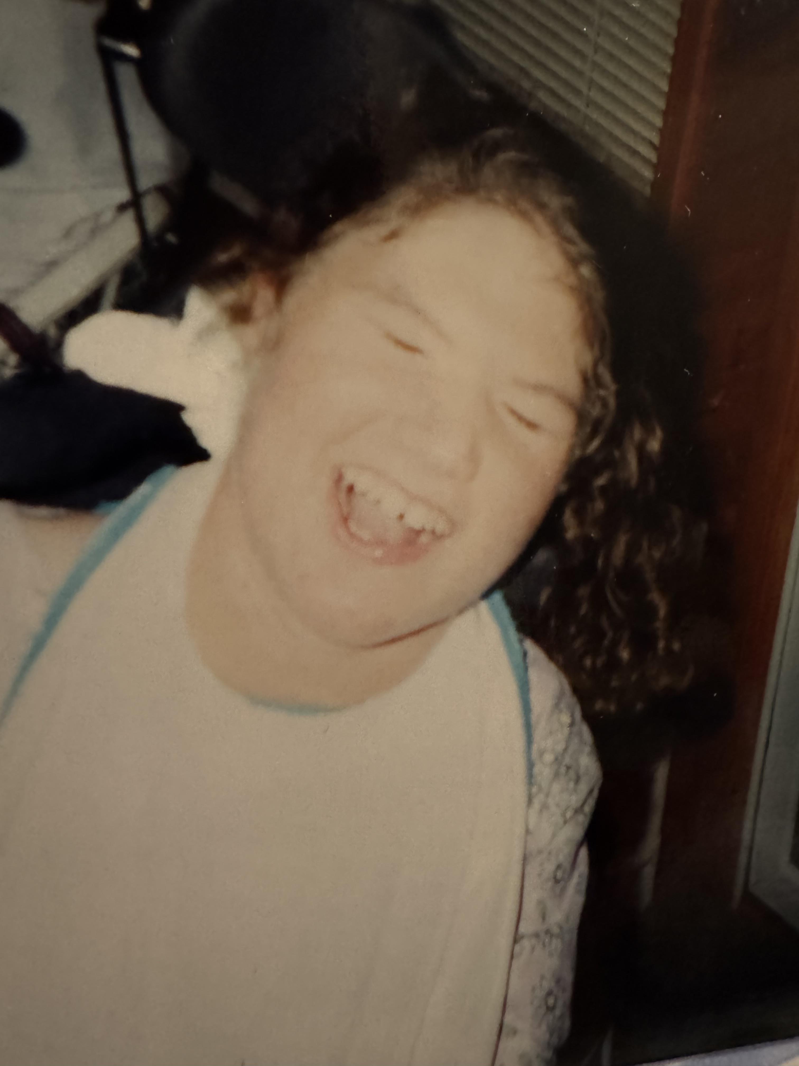 A person with eyes closed