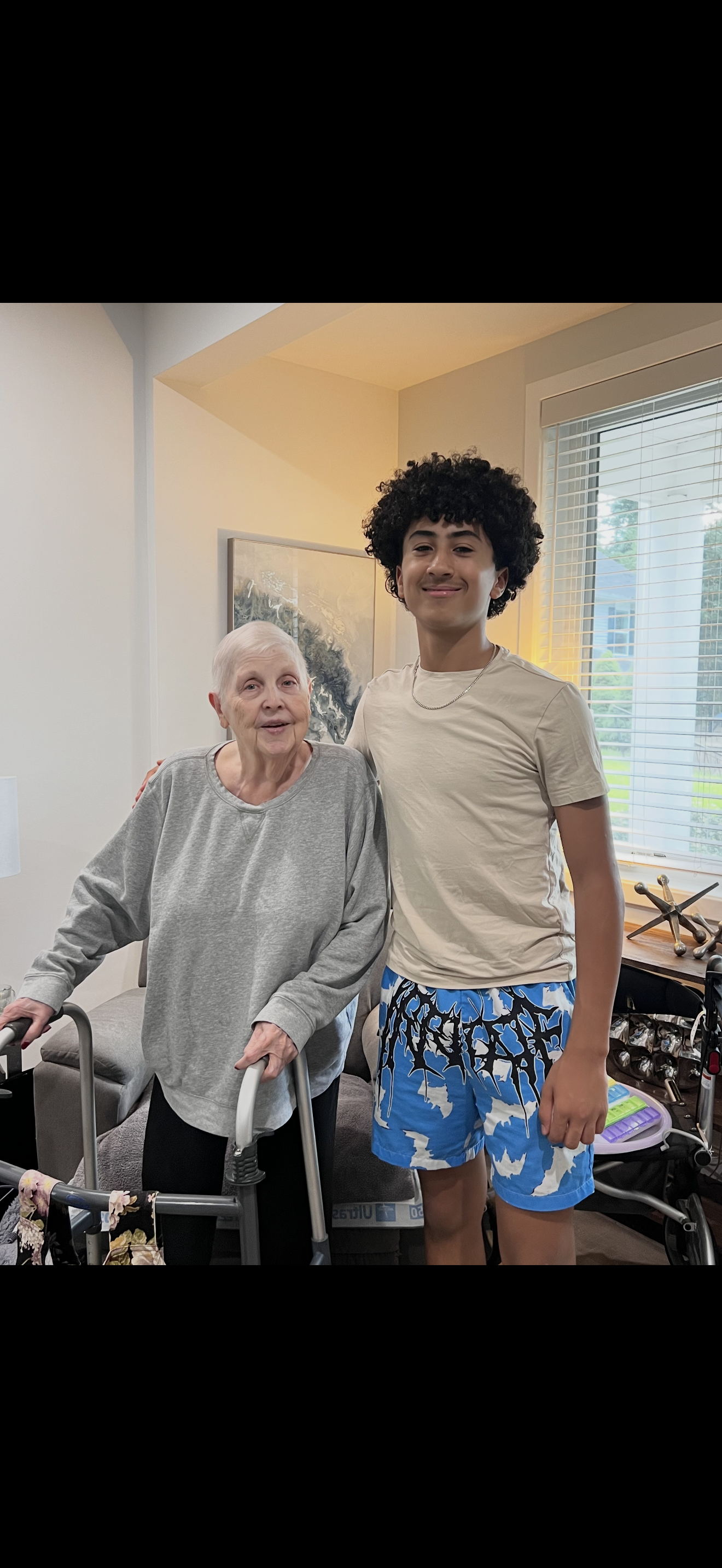 A man and woman standing next to each other