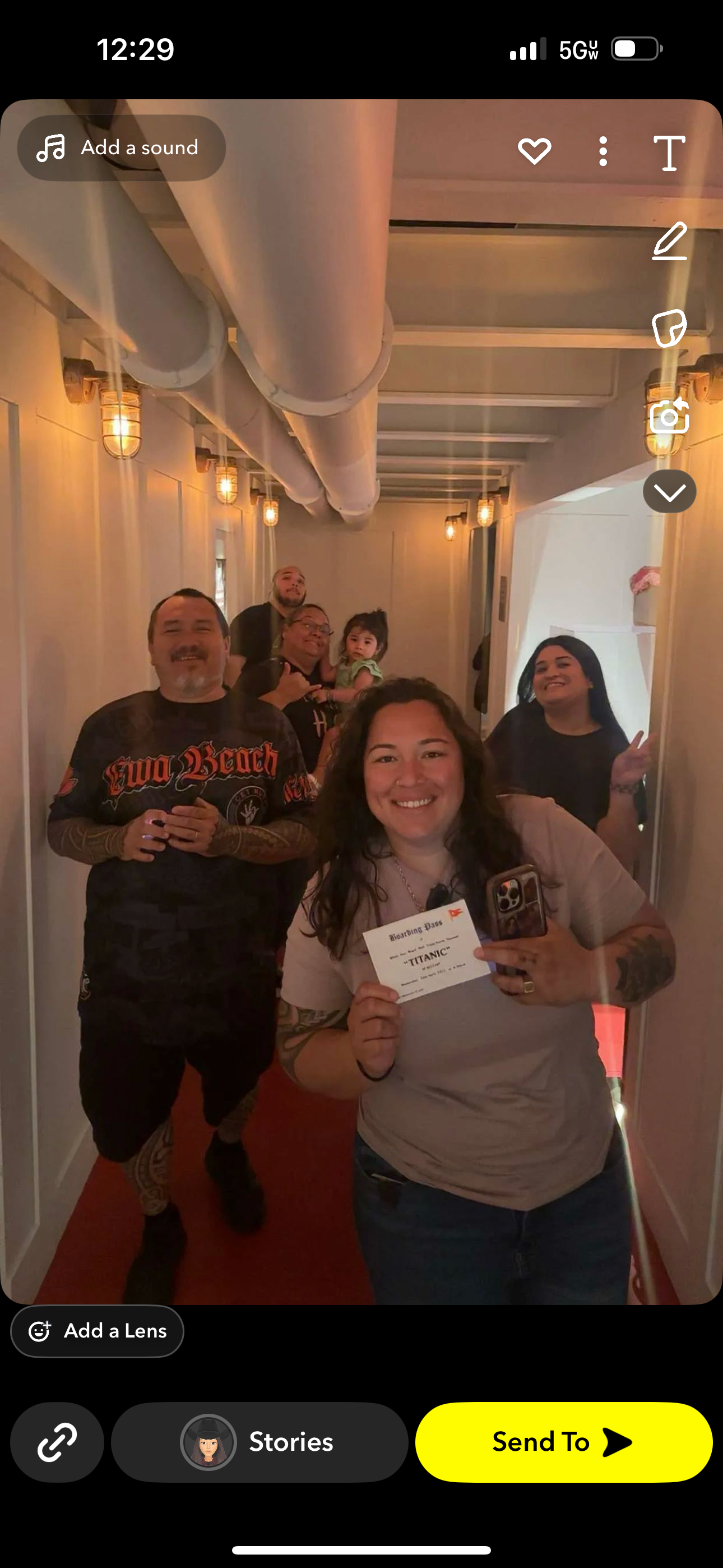 A group smiles as they celebrate completing an escape room challenge with a certificate.