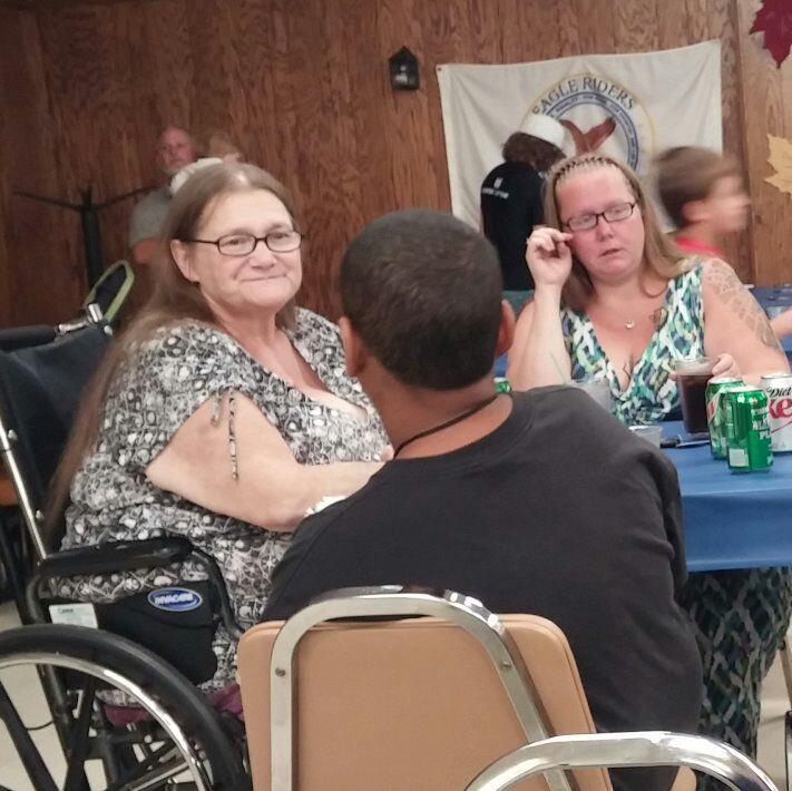 A group of people sitting at a table