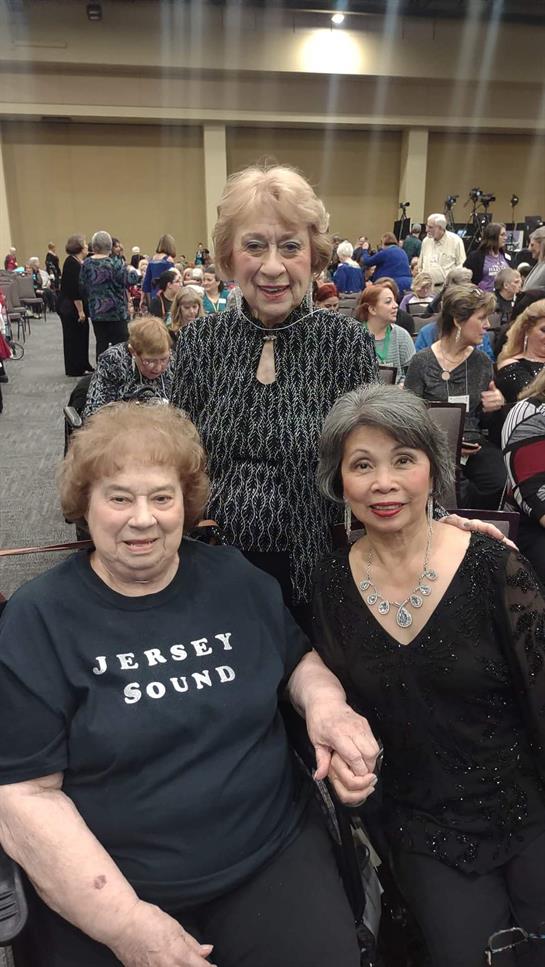A group of women posing for a photo