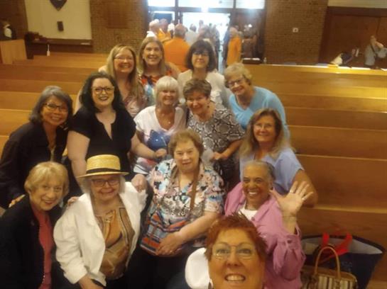 A group of women posing for a photo