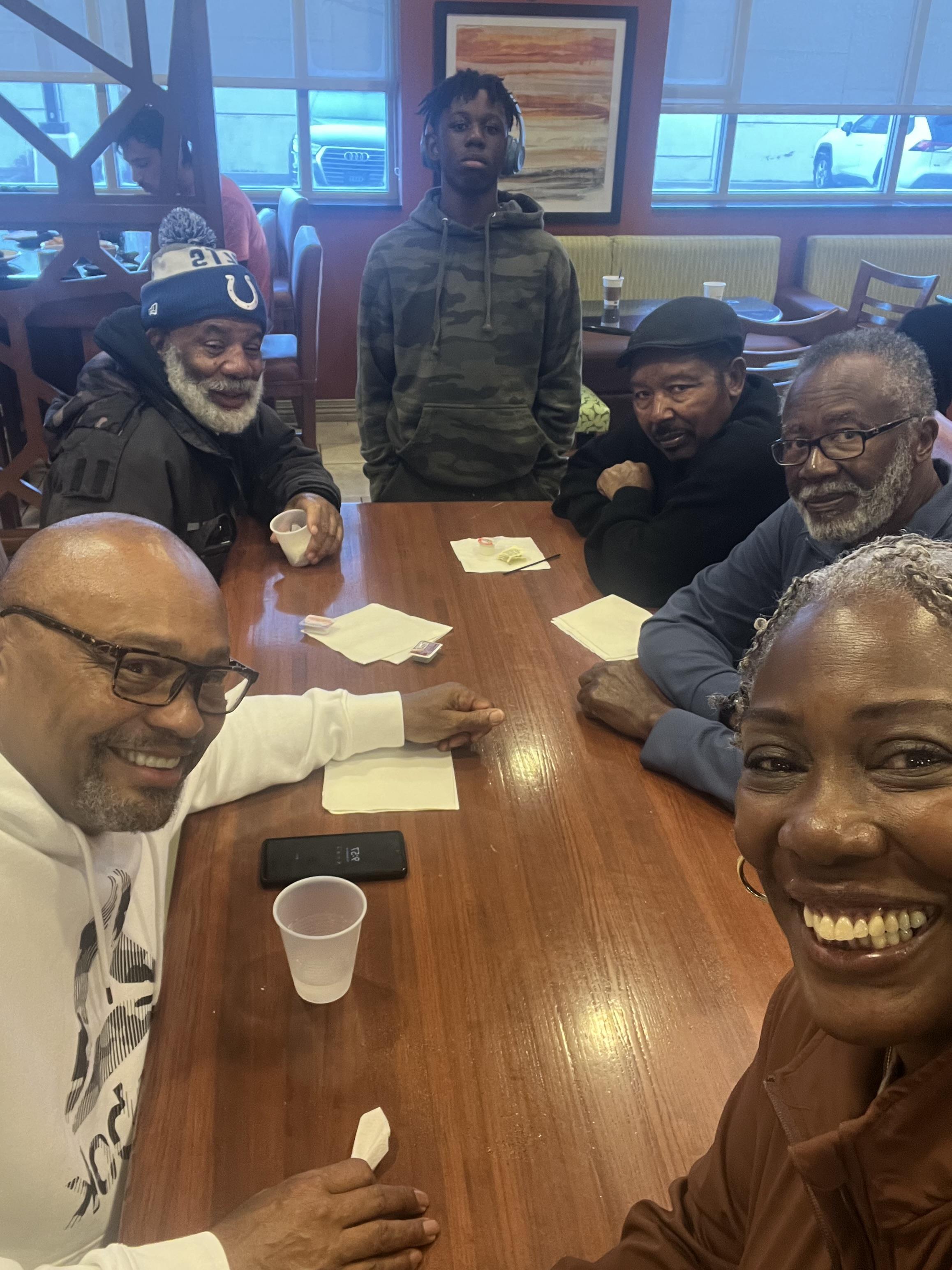 A group of people around a table