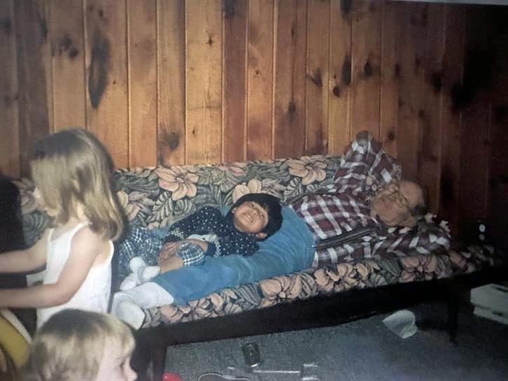 A child lying on a couch