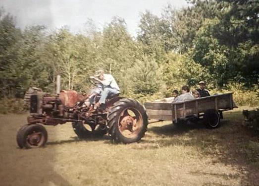 A group of people on a tractor
