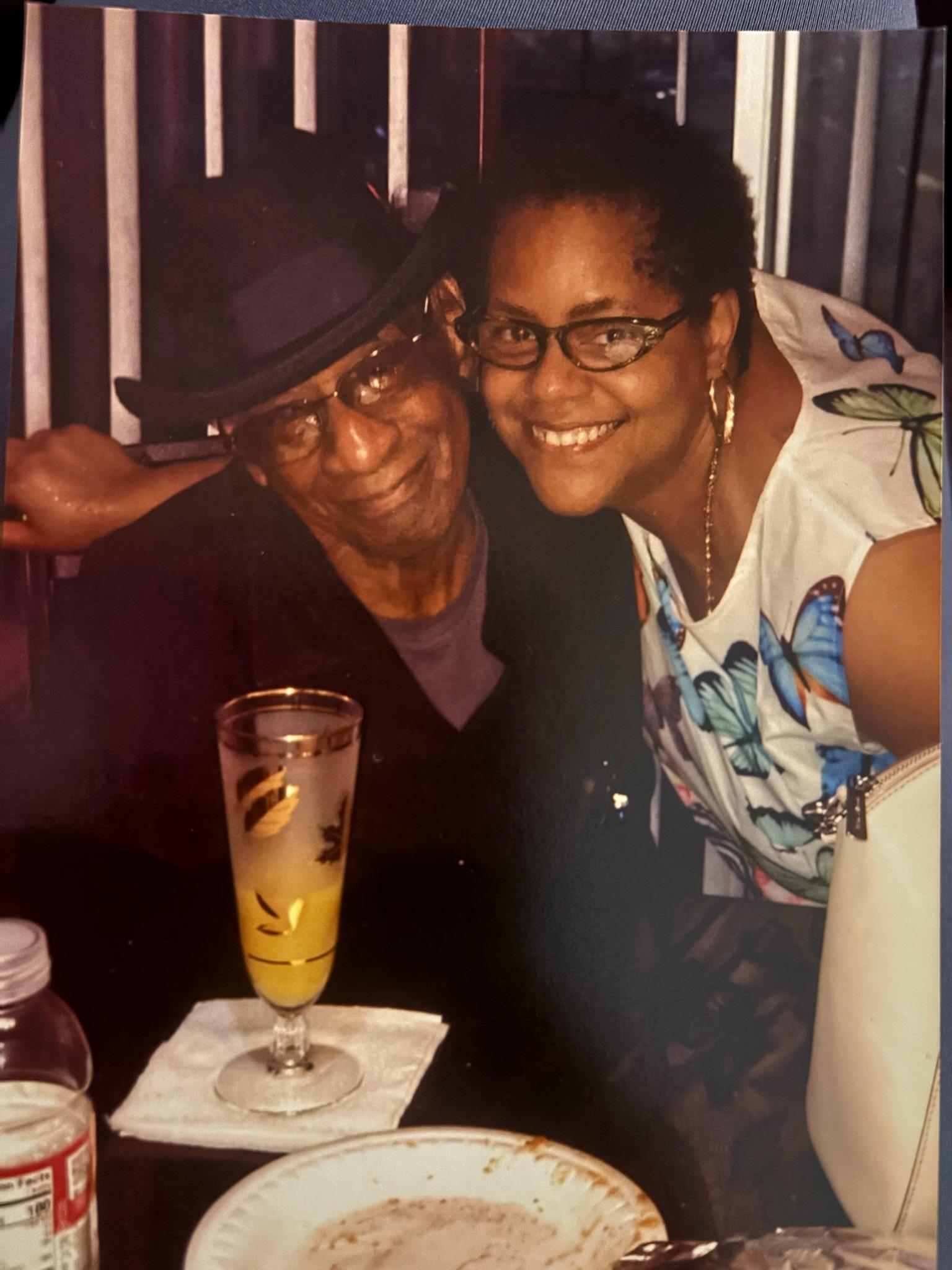 A man and woman sitting at a table