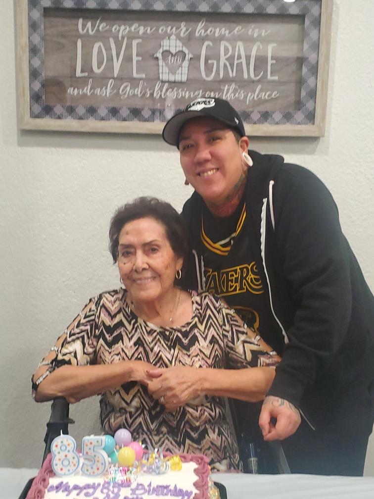 A man and woman posing for a picture