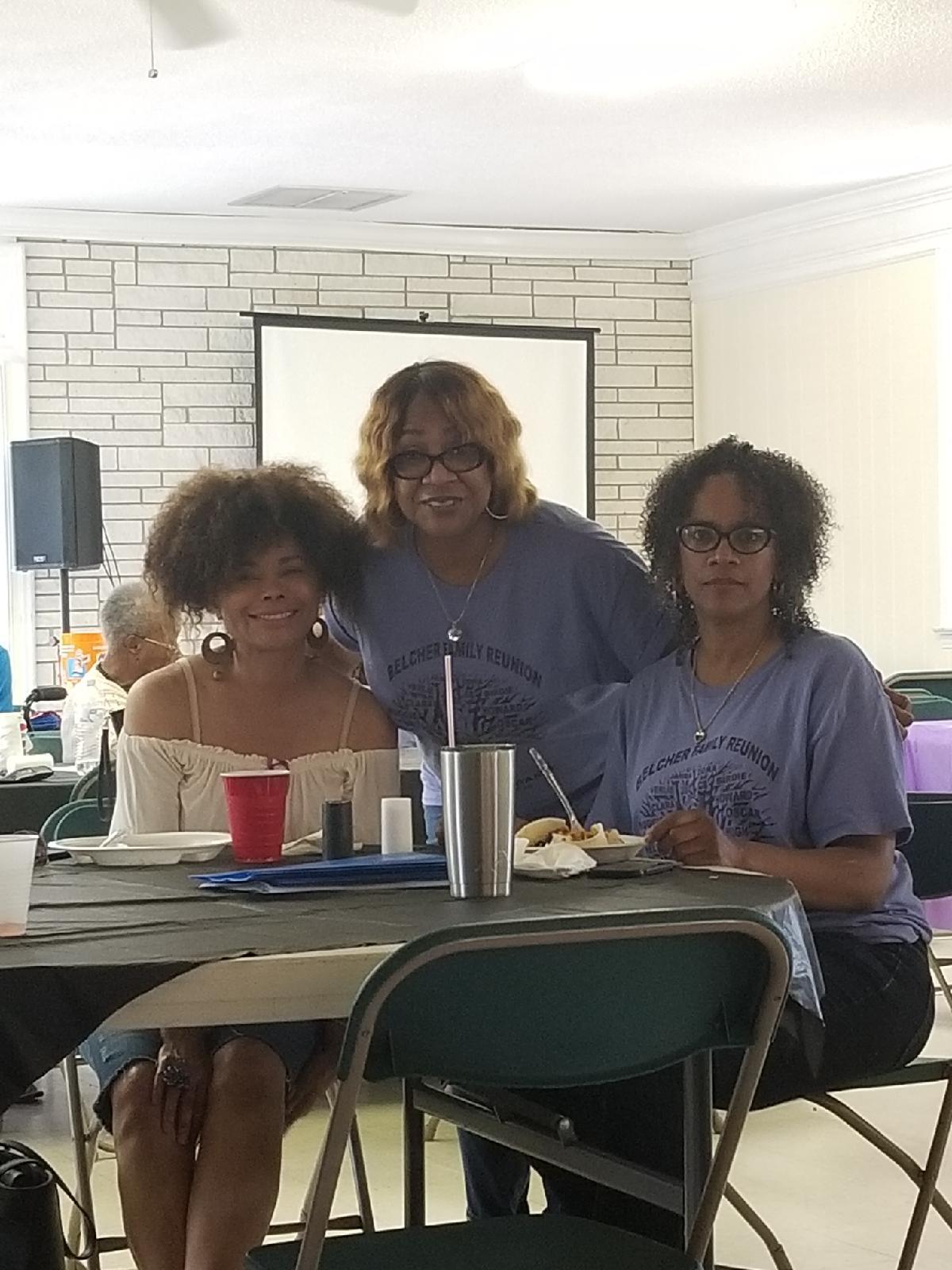 A group of women sitting at a table