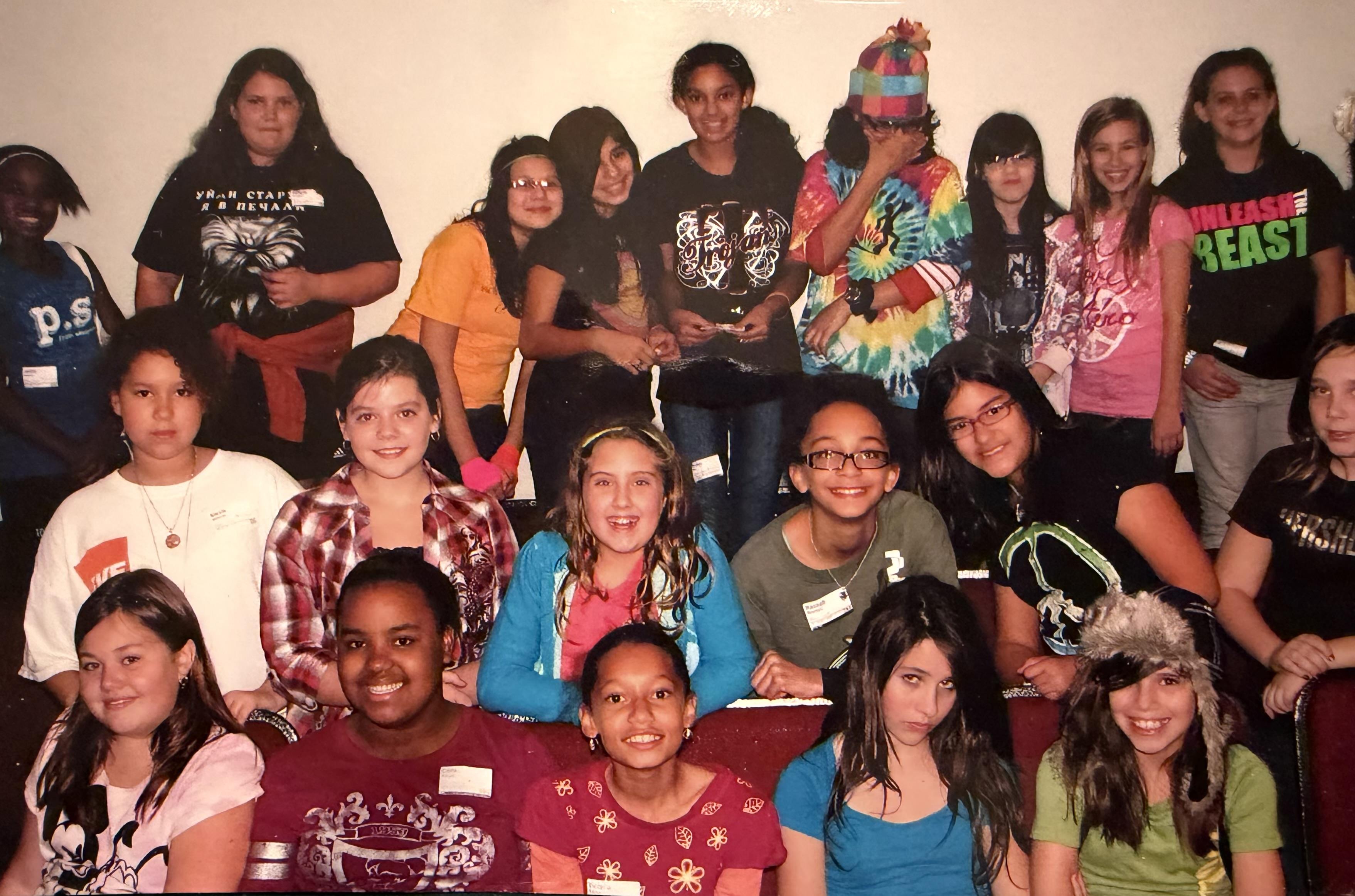 A group of young people posing for a photo
