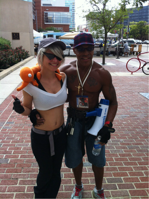 A man and woman posing for a picture
