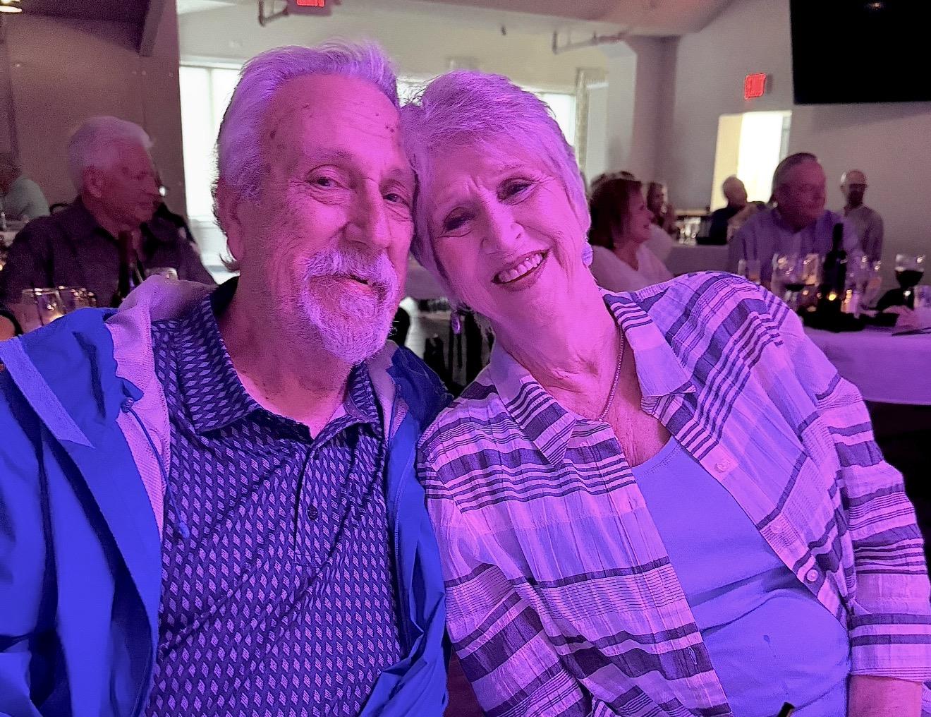 A man and woman sitting together