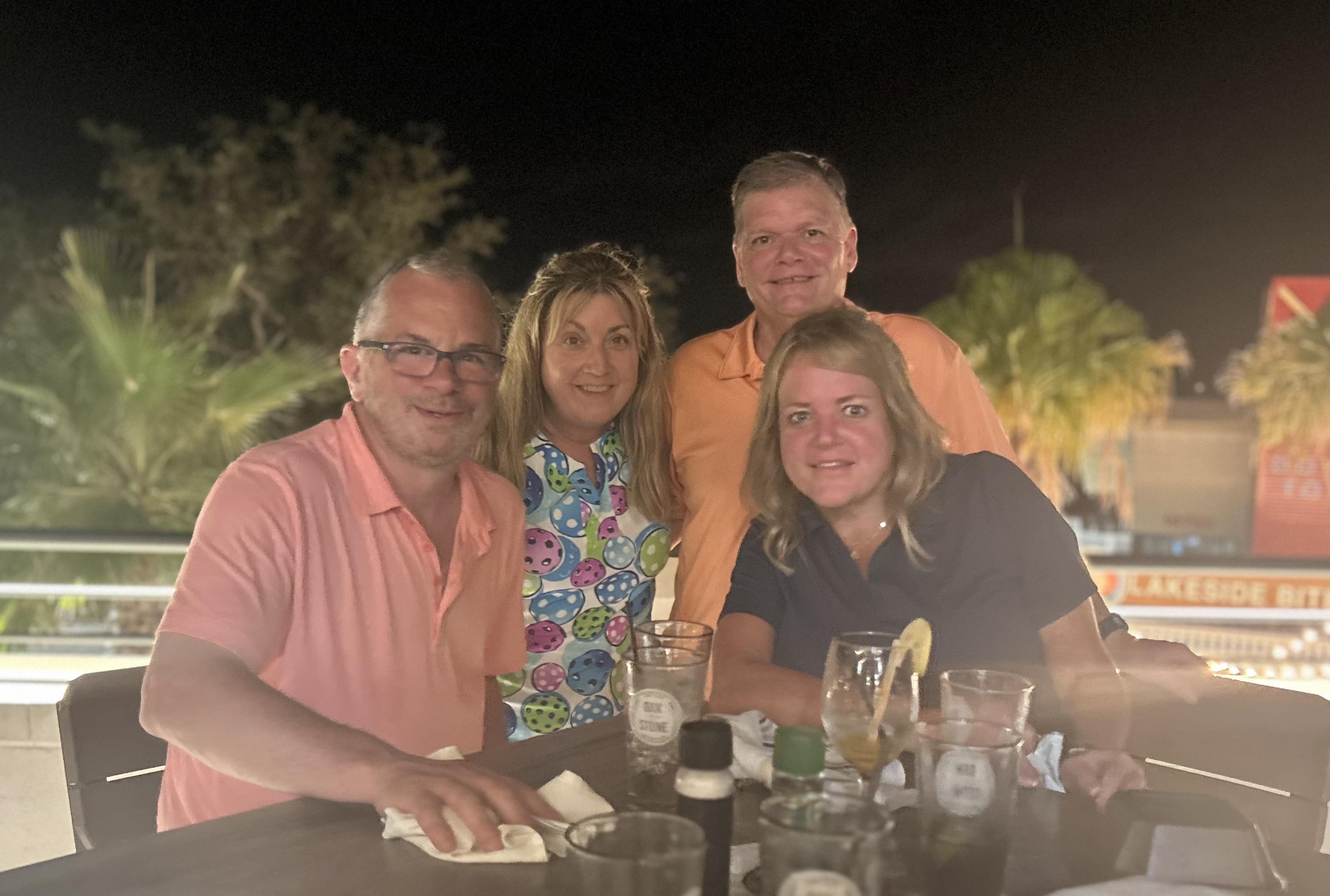 A group of people sitting at a table