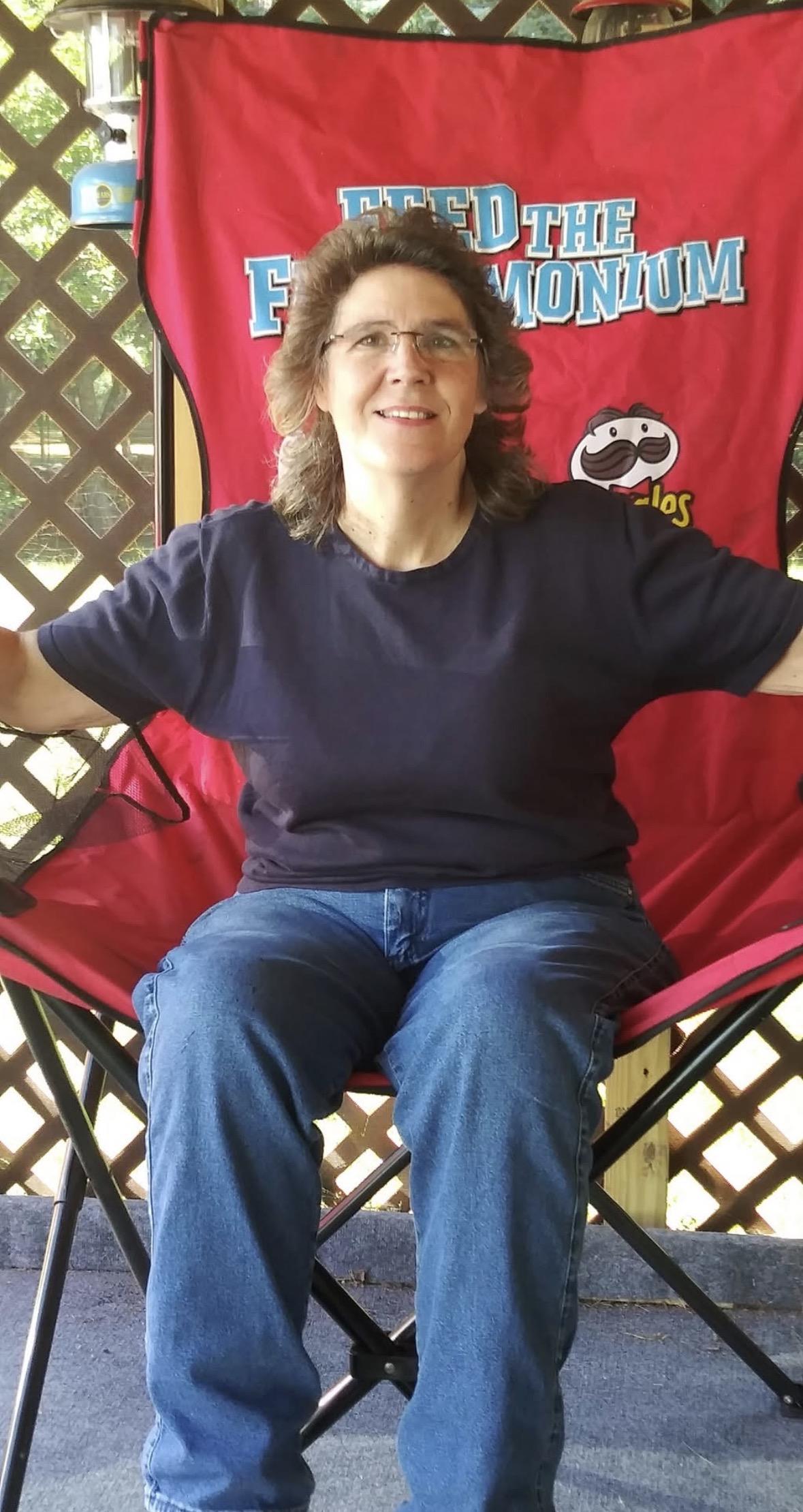 A woman sitting in a chair