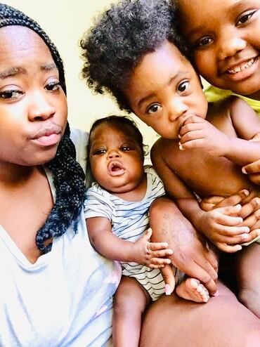 A group of children posing for a photo