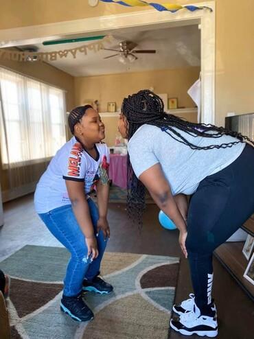A woman and a child in a room