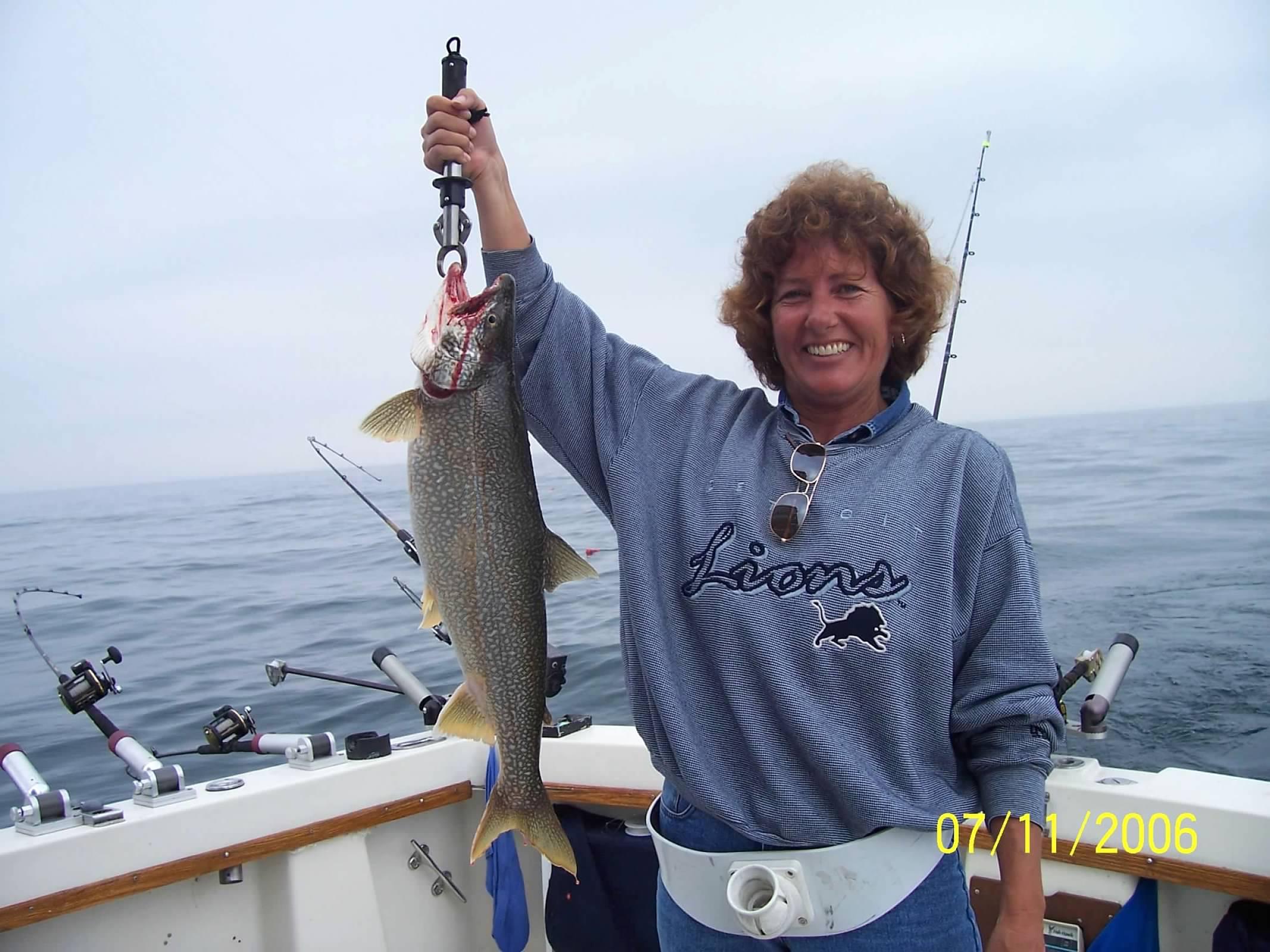 A woman holding a fish