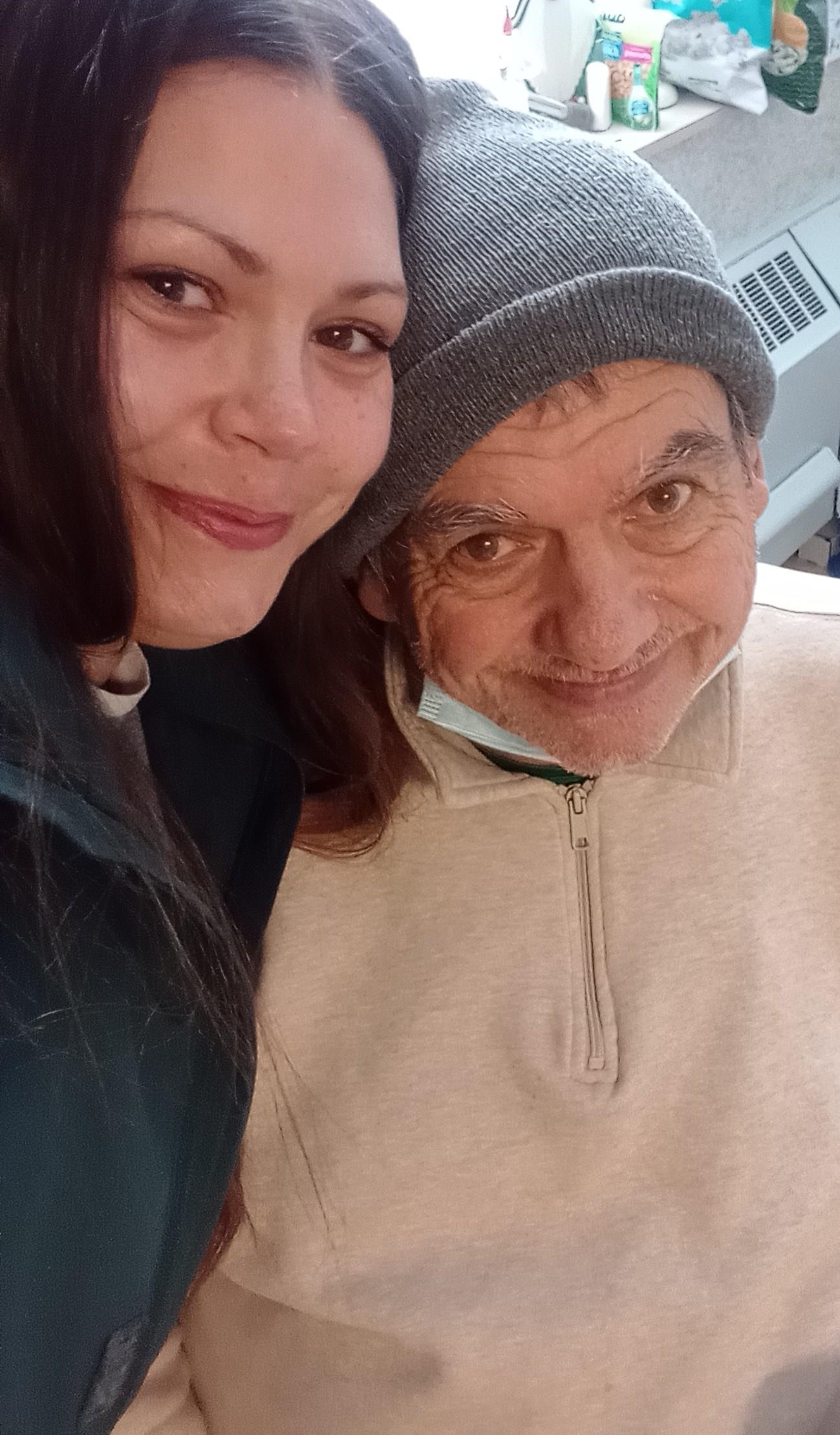 A woman and man taking a selfie