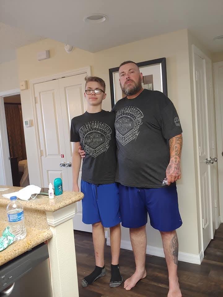 Two men standing in a room