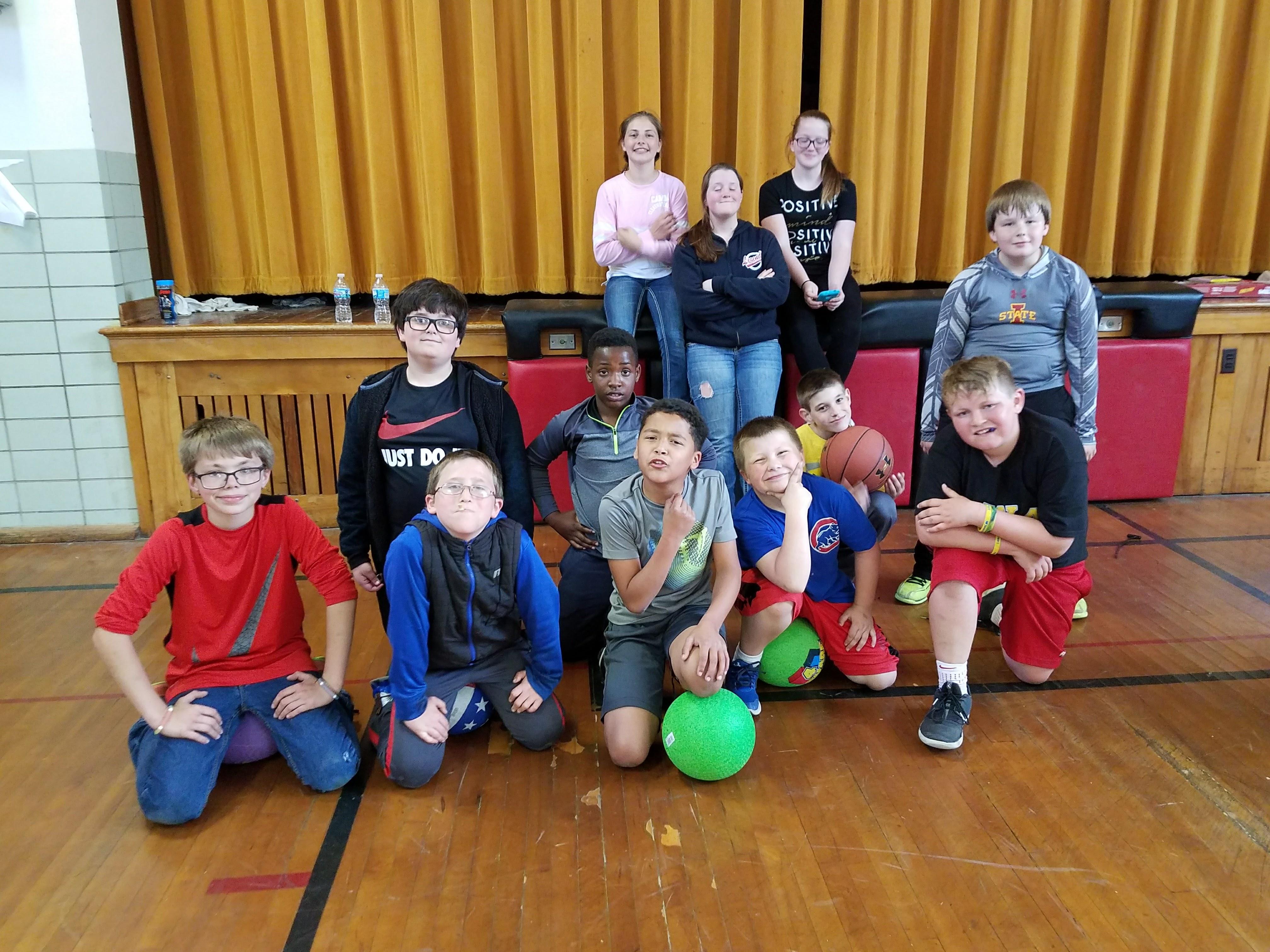 A group of kids posing for a photo