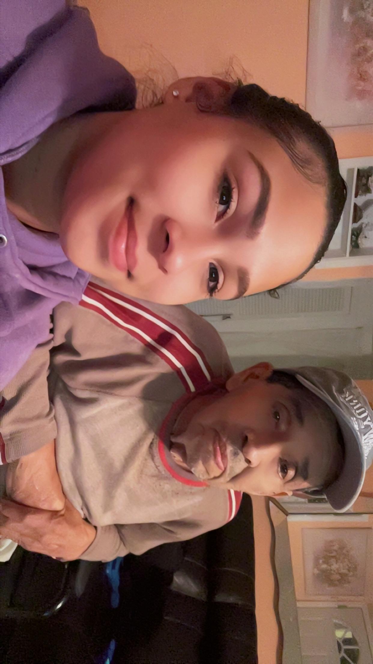 A man and woman taking a selfie