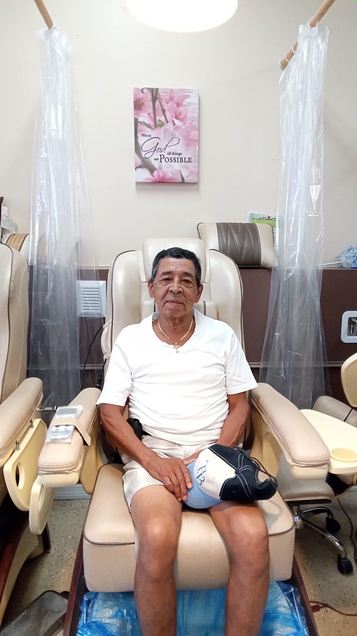 A man sitting in a chair