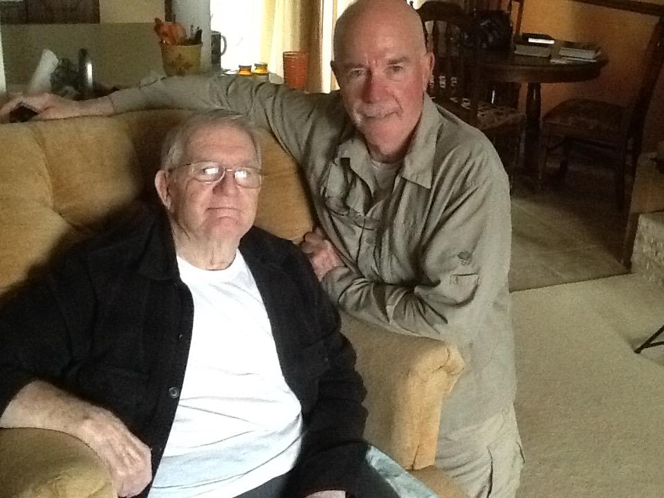 Two men sitting on a couch