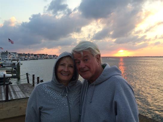A man and woman standing next to each other