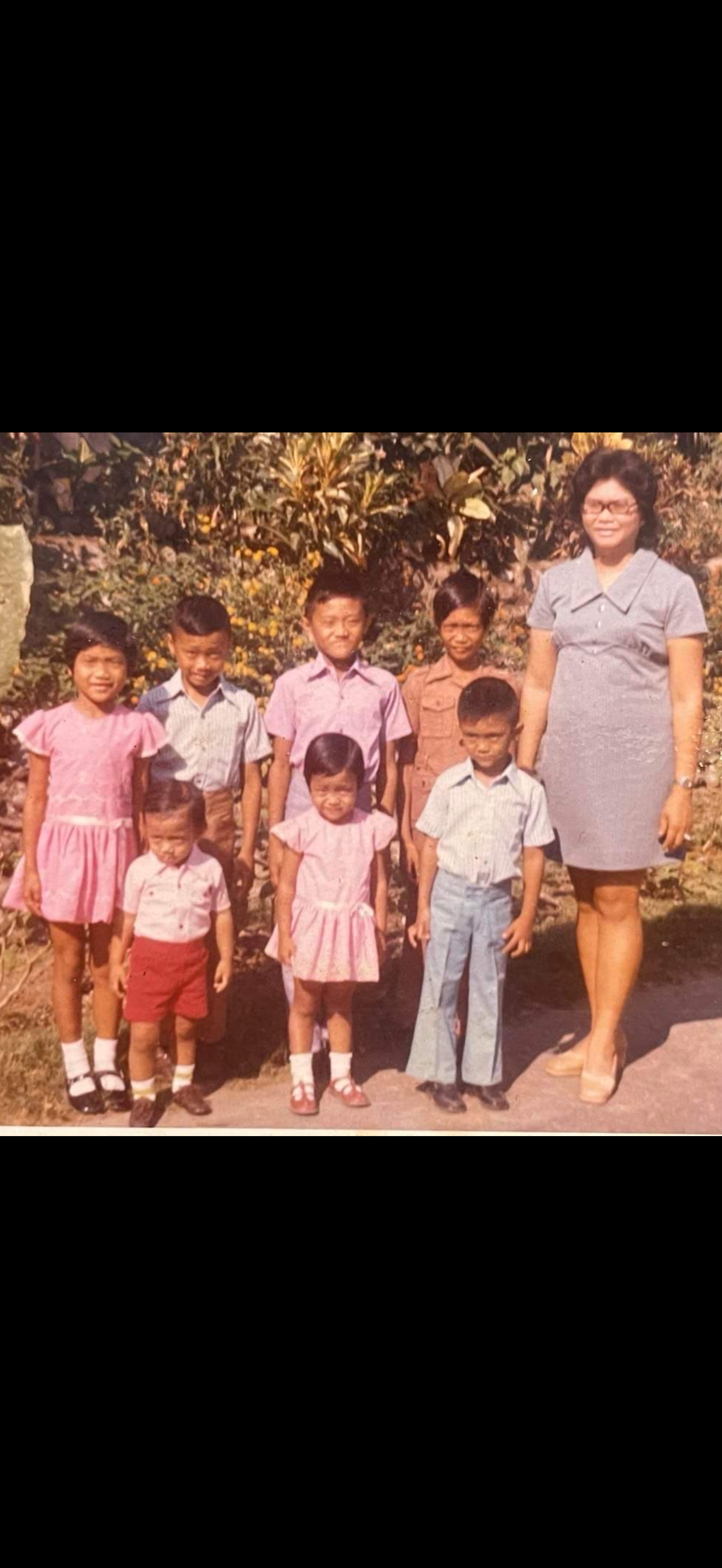 A group of children posing for a photo