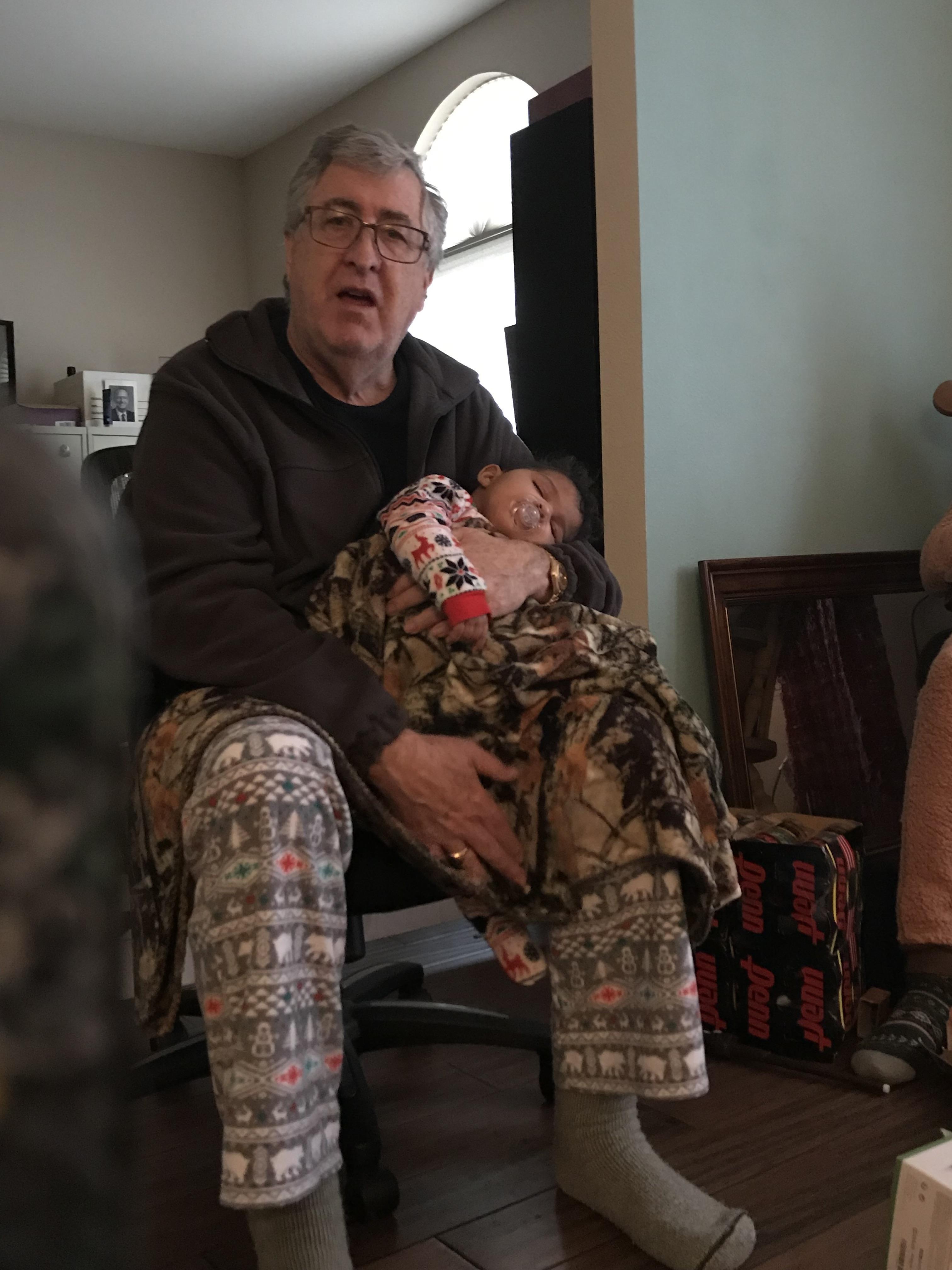 A man holding a baby