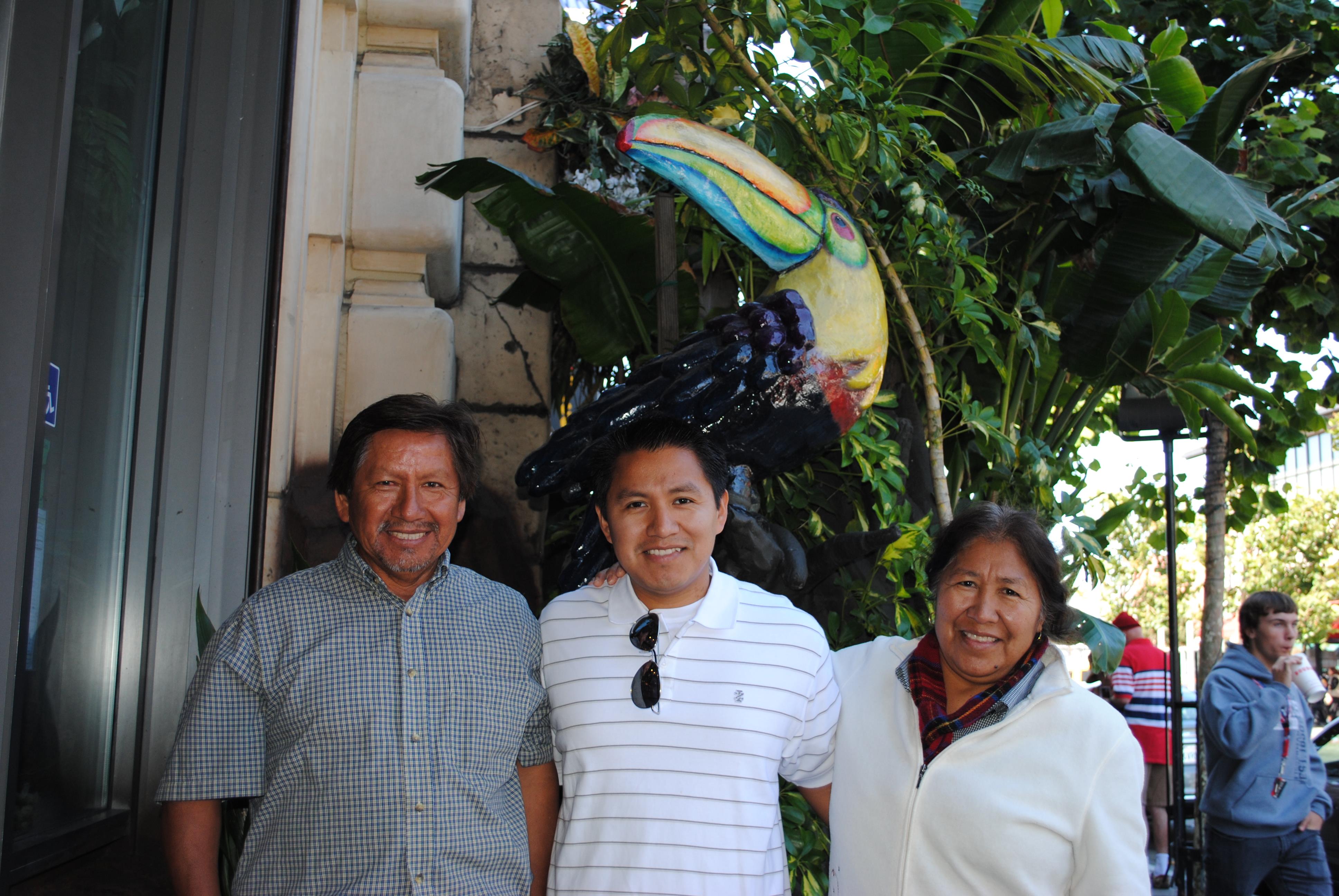 A group of people standing in front of a building