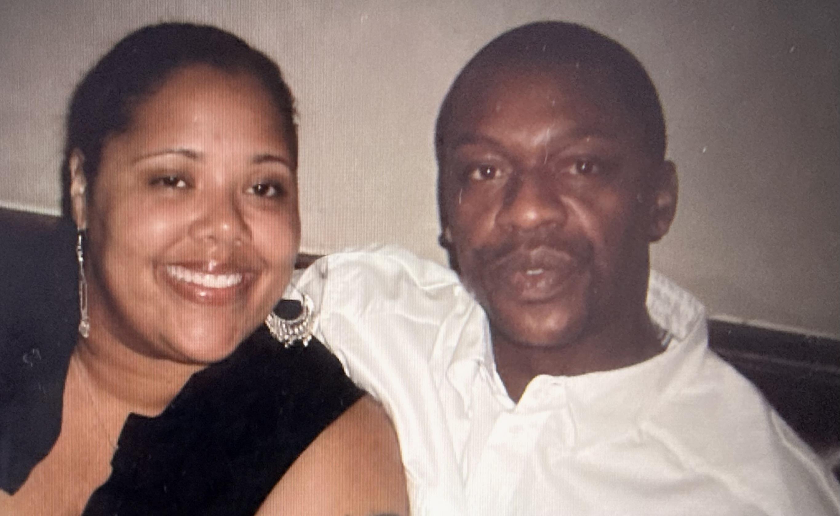 A man and woman smiling for a picture