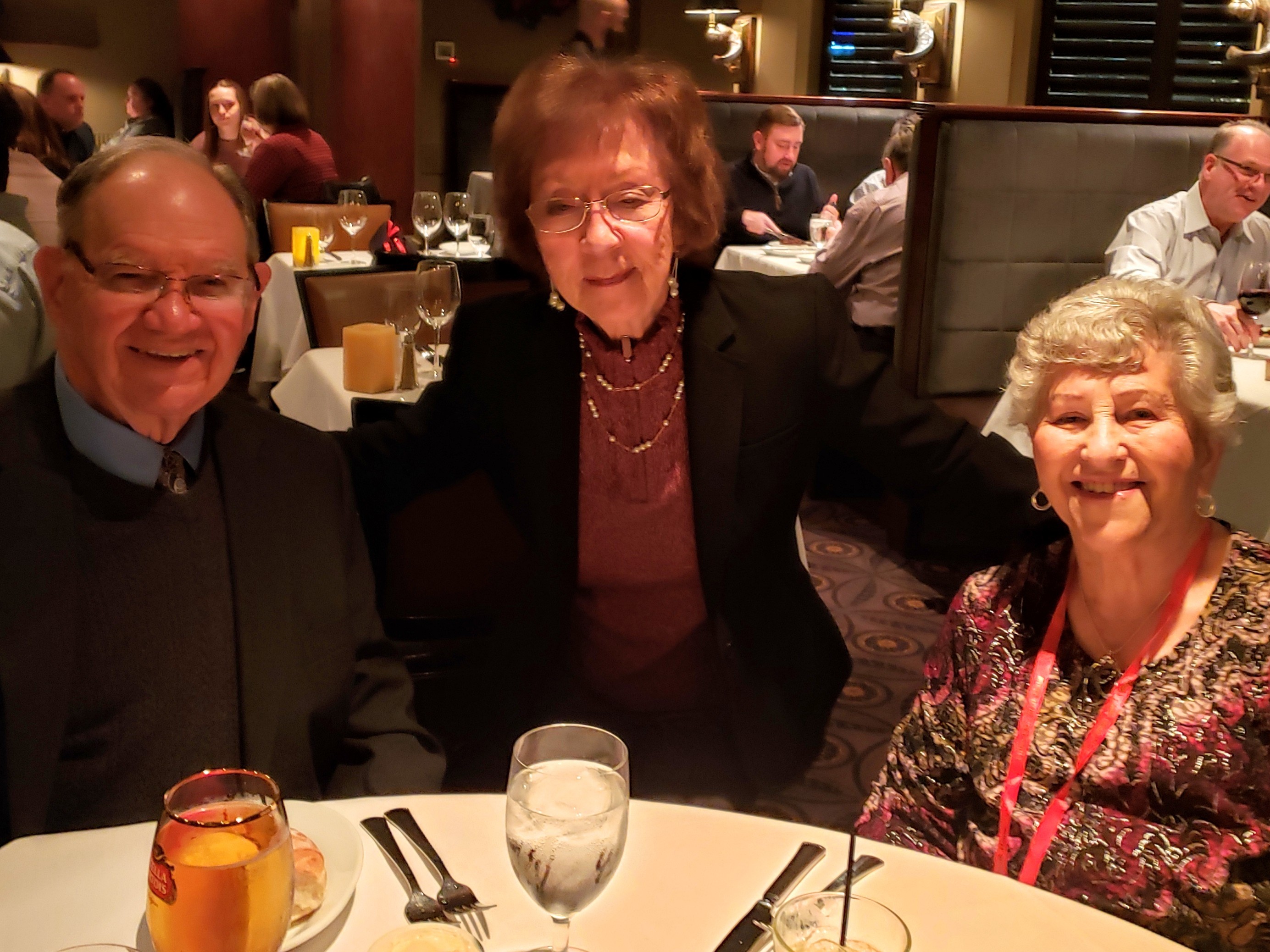 A group of people sitting at a table