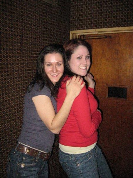 A couple of women hugging each other