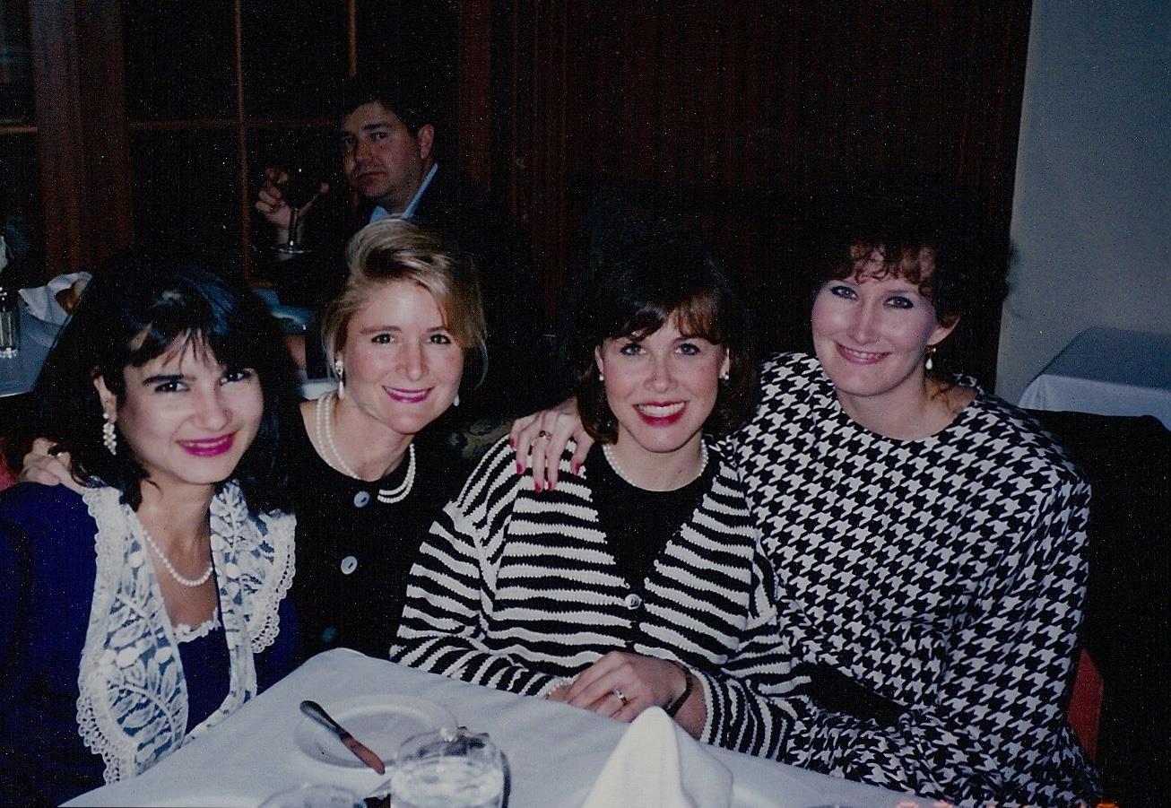 A group of women posing for a photo