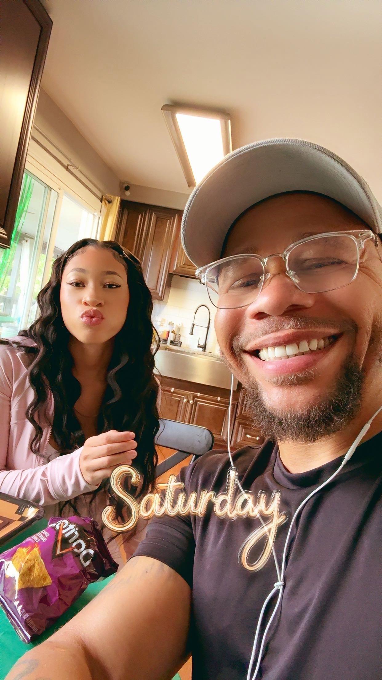 A man and woman taking a selfie