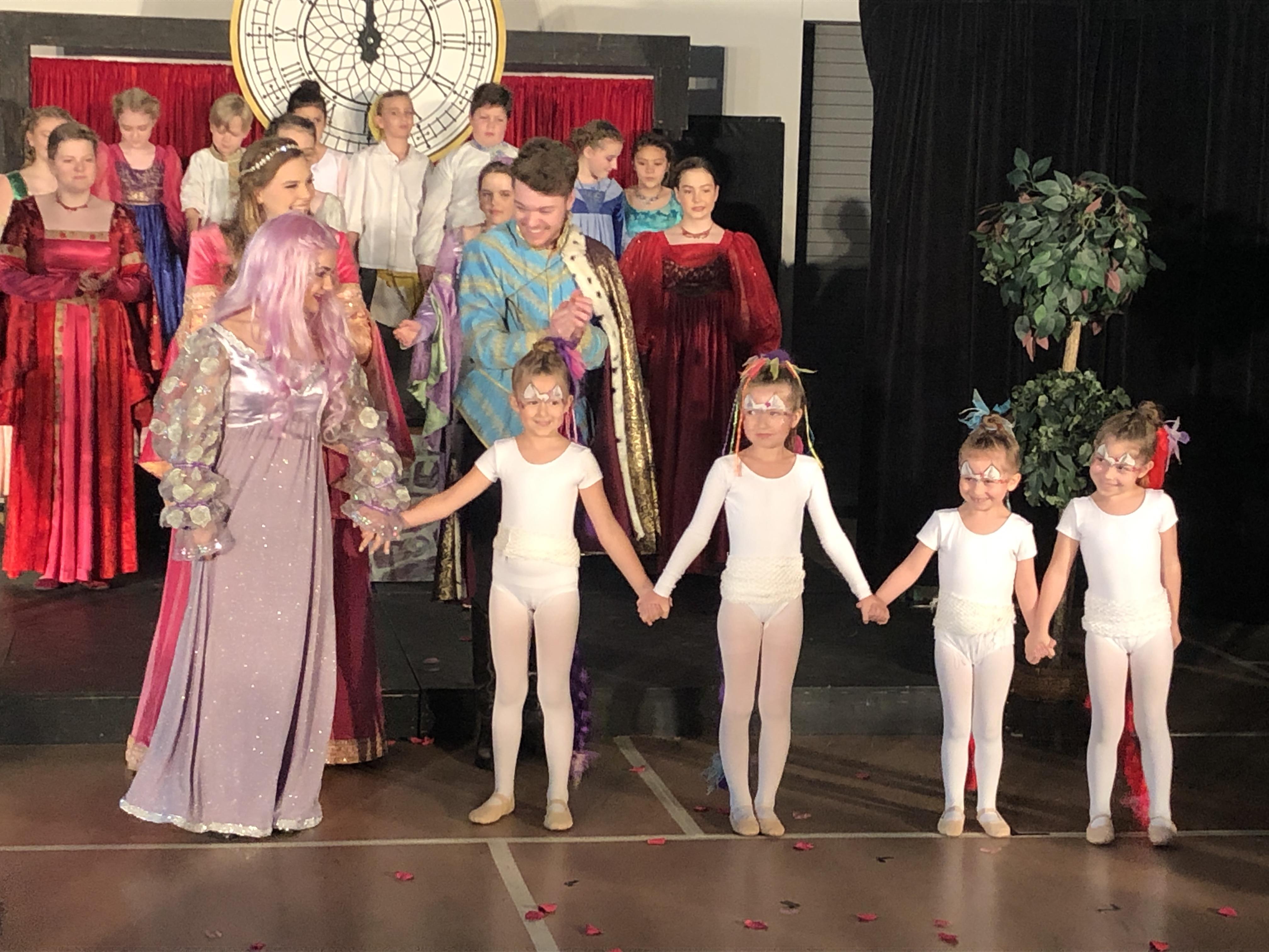 A group of people holding hands