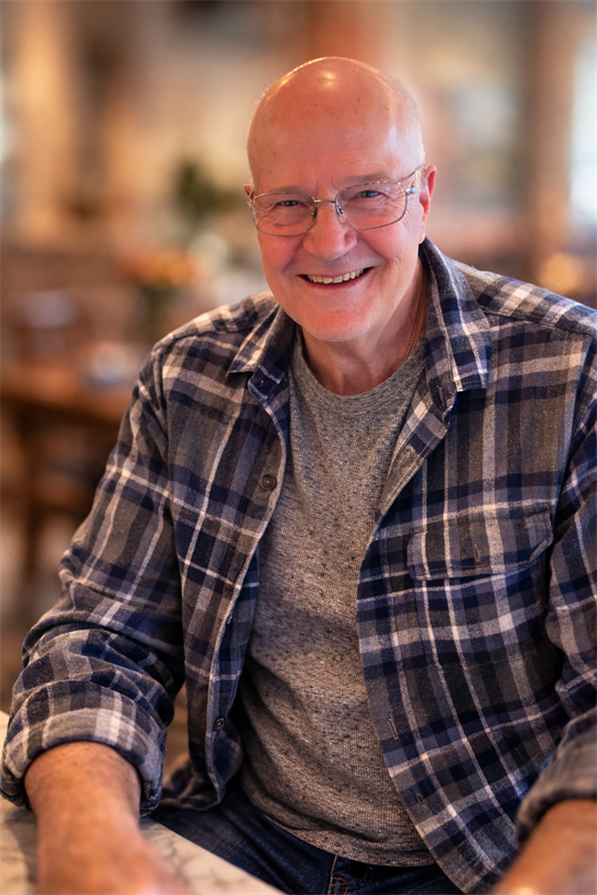 A man smiling at the camera