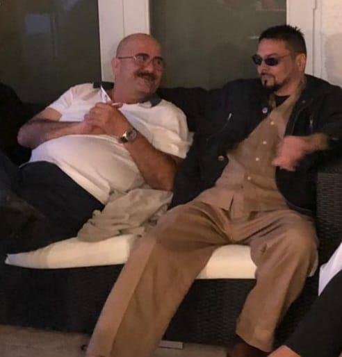 Two men sitting on a couch