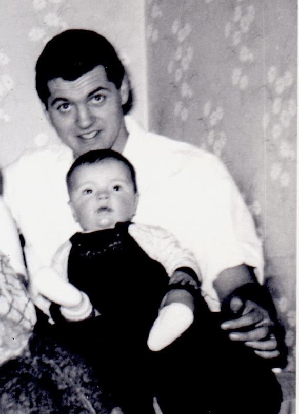 A man holding a baby