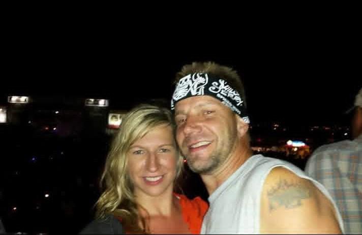 A man and woman taking a selfie