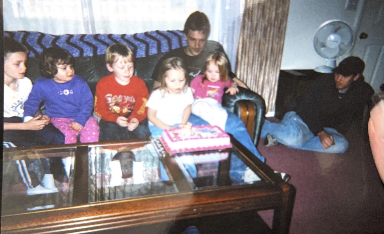 A group of people sitting on a couch