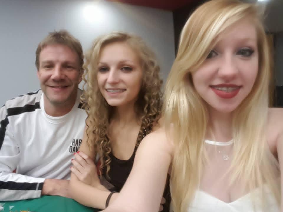 A group of people posing for a selfie