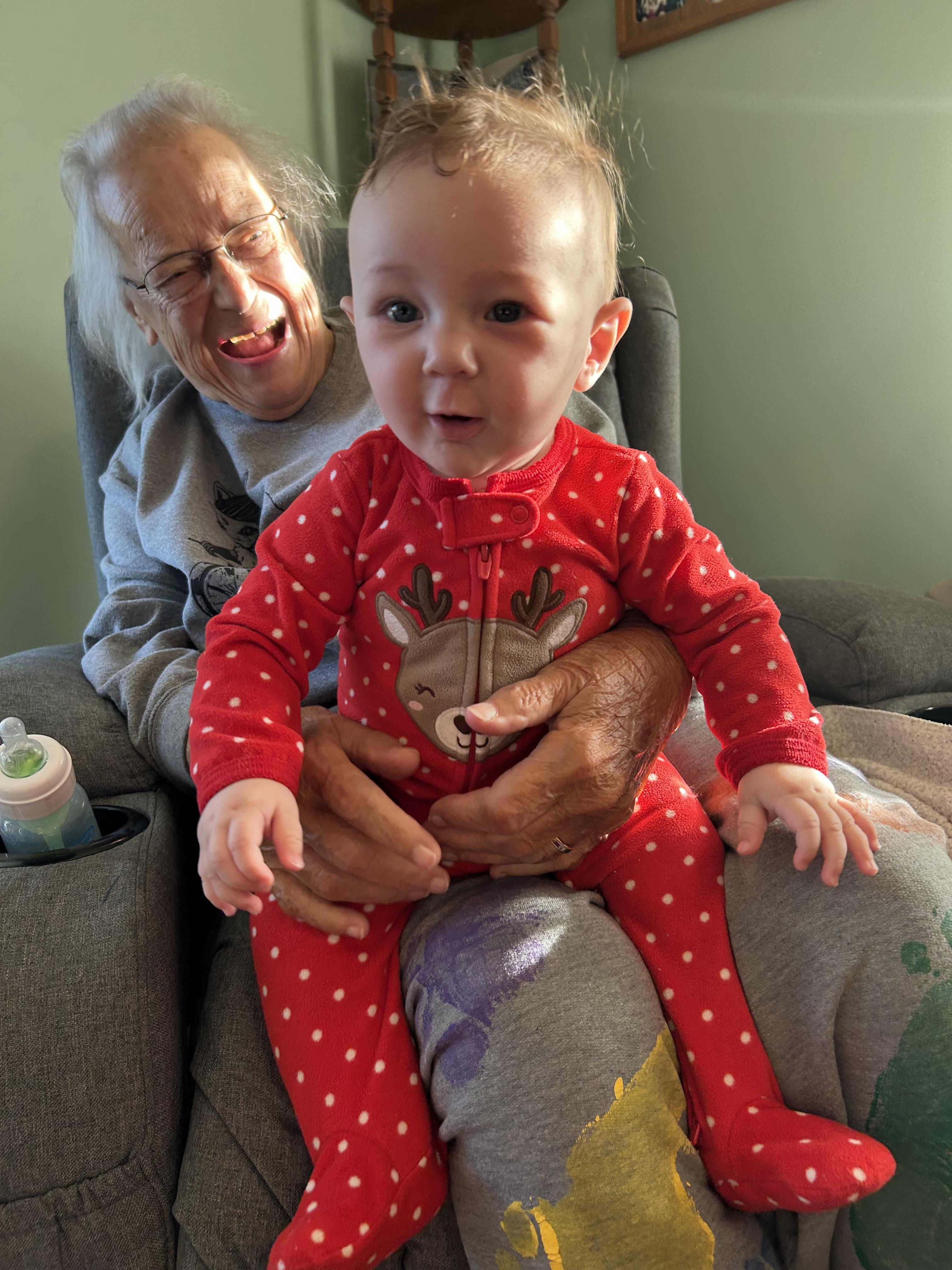 A woman holding a baby